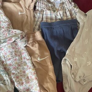 Bundle of newborn clothes